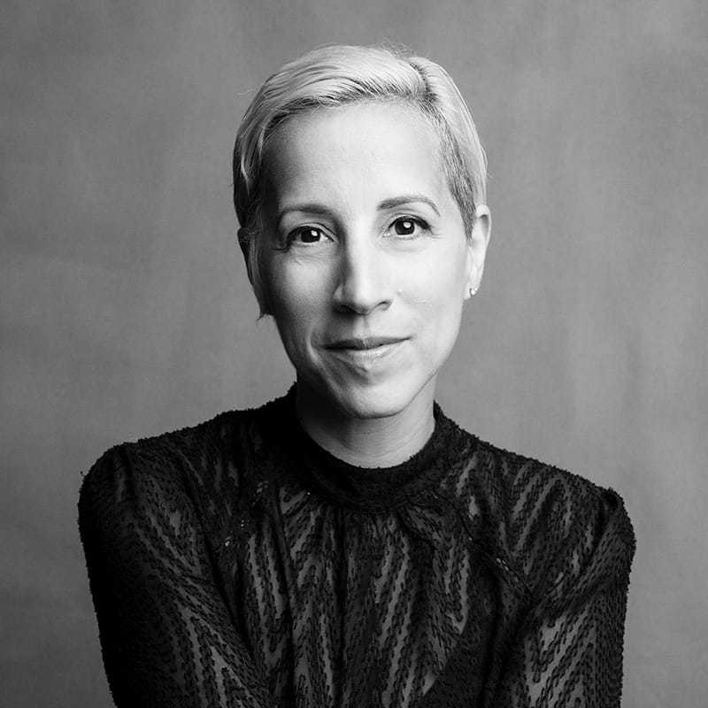 Portrait of Janis, a professional stylist at Joe's Salon, showcasing their expertise and style.