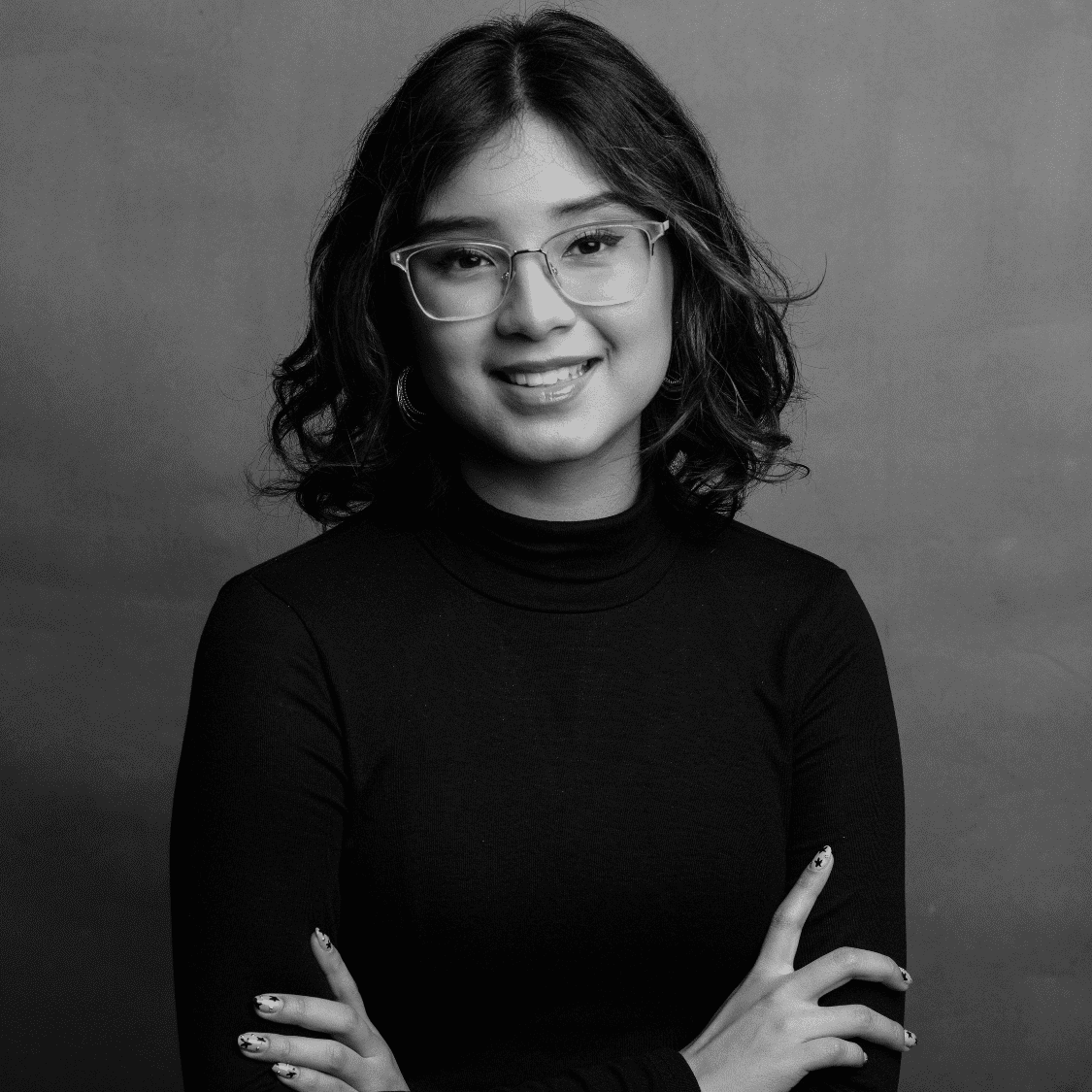 Portrait of Marlet, a professional stylist at Joe's Salon, showcasing their expertise and style.