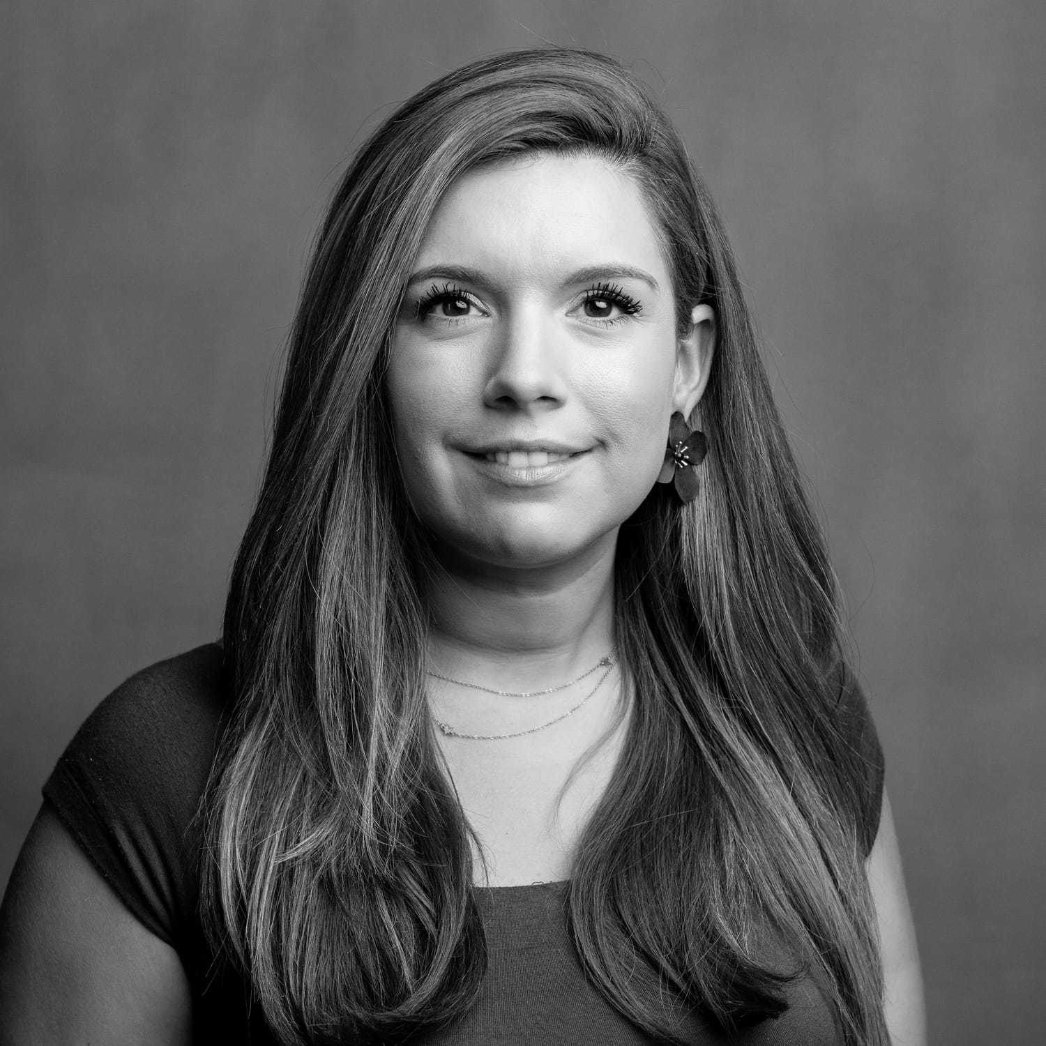 Portrait of Victoria, a professional stylist at Joe's Salon, showcasing their expertise and style.