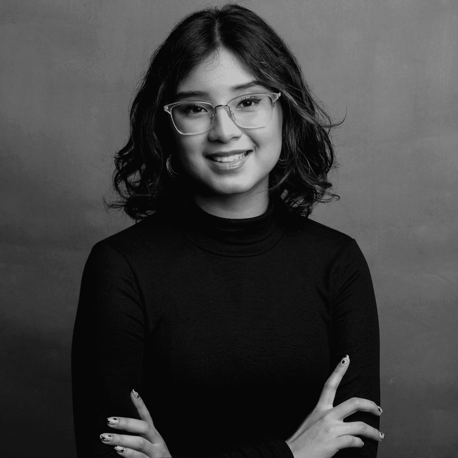 Portrait of Marlet, a professional stylist at Joe's Salon, showcasing their expertise and style.