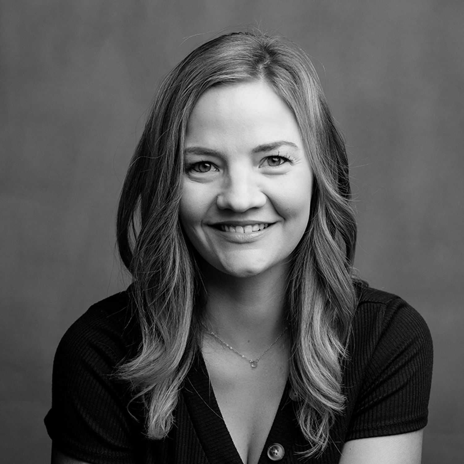 Portrait of Aanna, a professional stylist at Joe's Salon, showcasing their expertise and style.