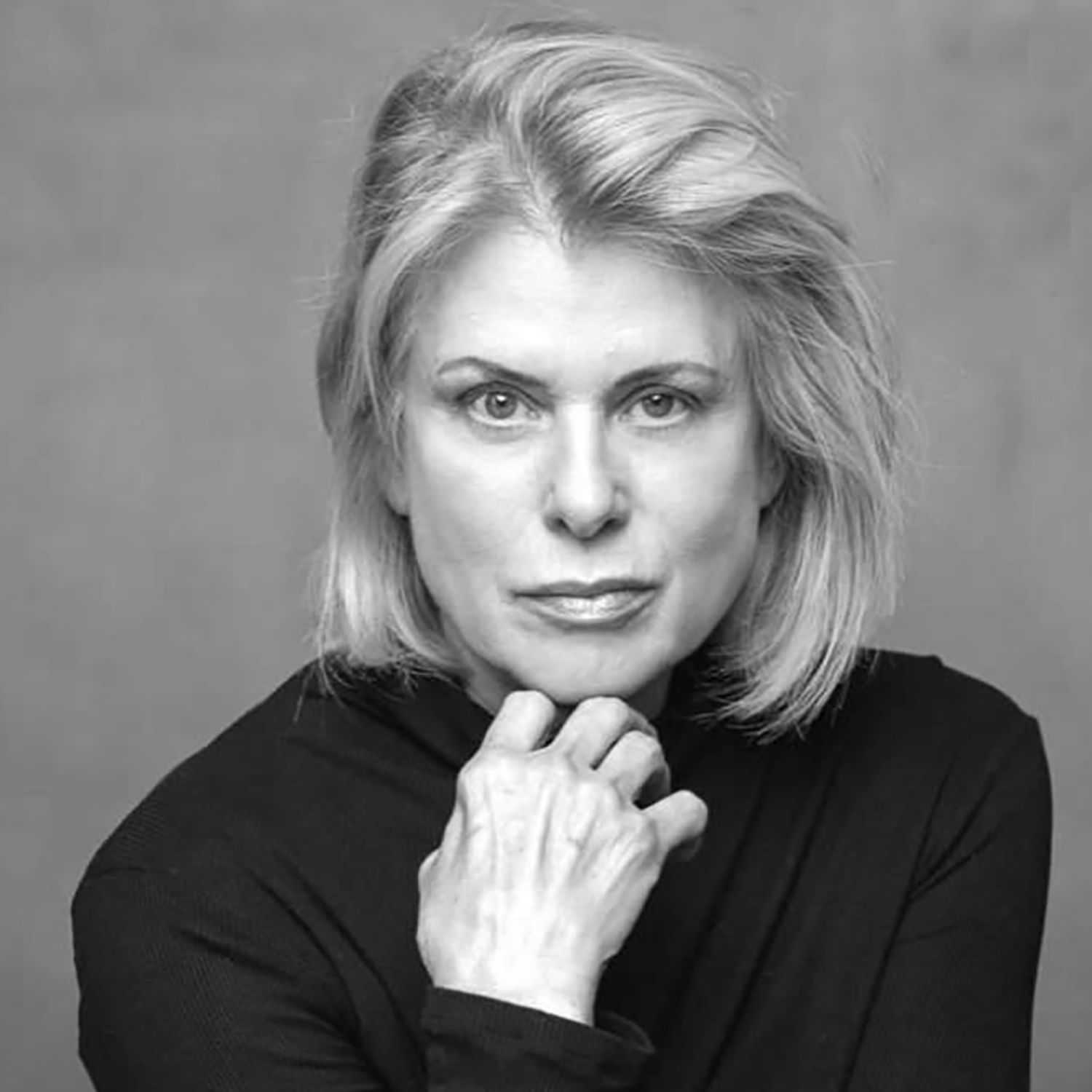 Portrait of Karen, a professional stylist at Joe's Salon, showcasing their expertise and style.